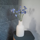 Sweet peas in blue paper