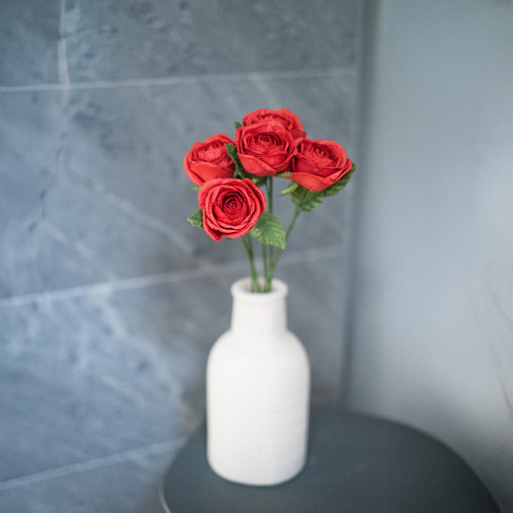 Bright red paper rose Rosa