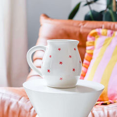 Jarra florida blanca y rosa