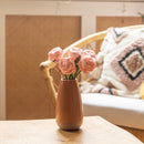 Renoncule en papier rose clair